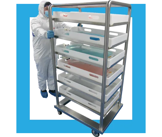 trolleys moved by cleanroom technician