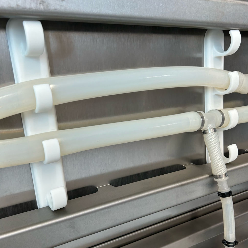 wall mounted tube management rows of tubes